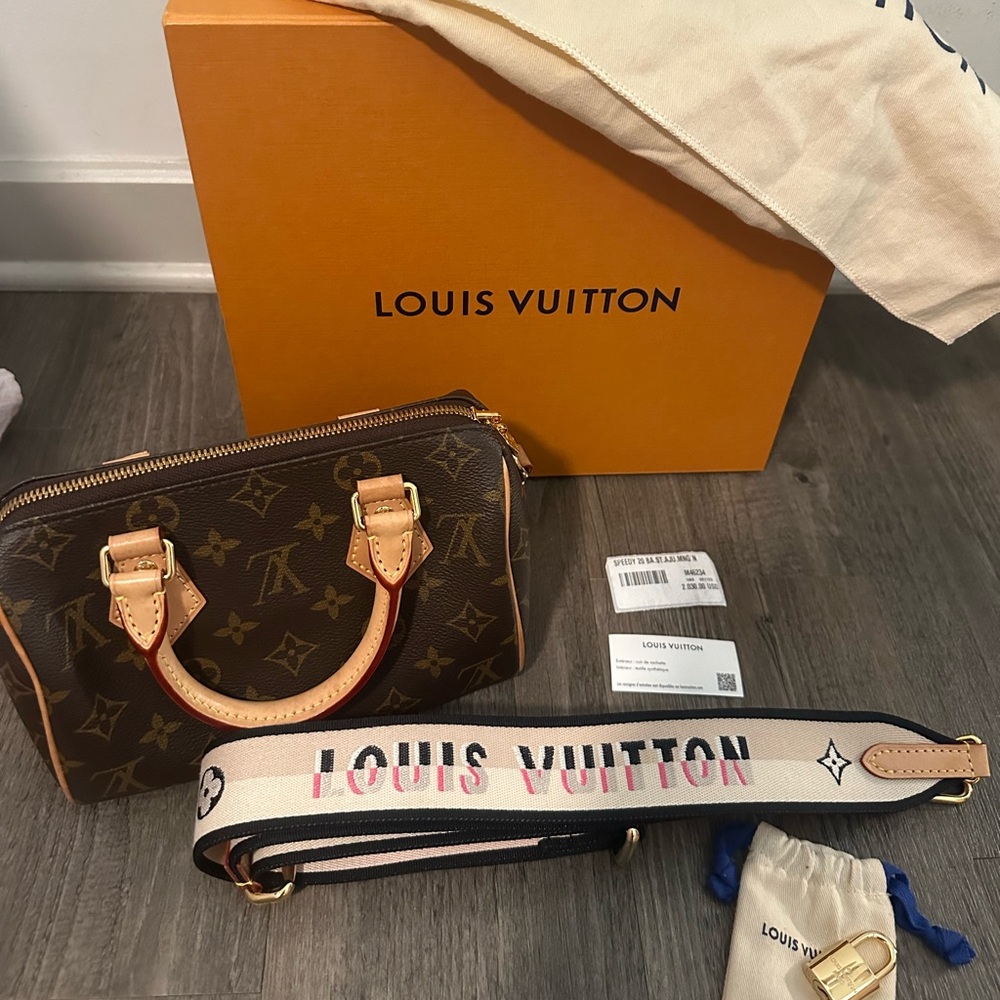Louis Vuitton Beige and Black Strap with Gold Lock